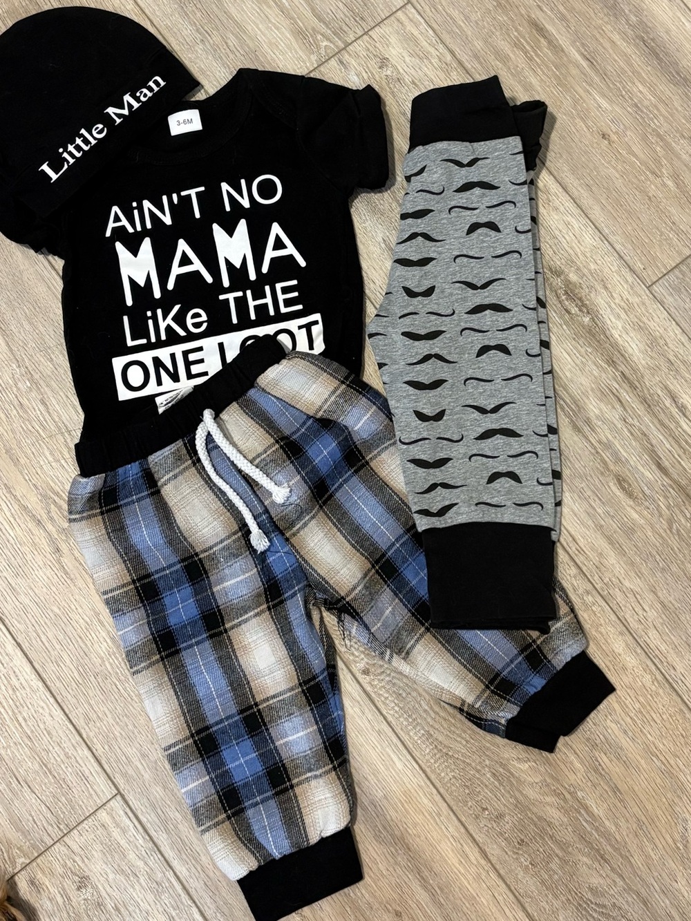 UNBRANDED | Black Baby One-Piece Bodysuit with Hat and 2 pairs of pants